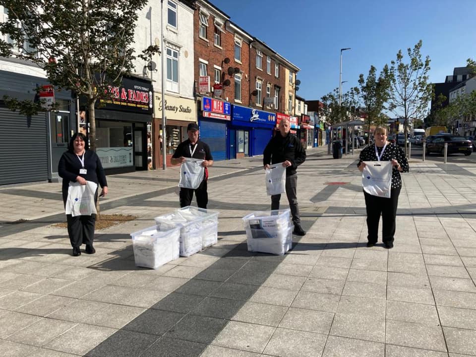 The BID hands out COVID-19 goody bags in Carters Green