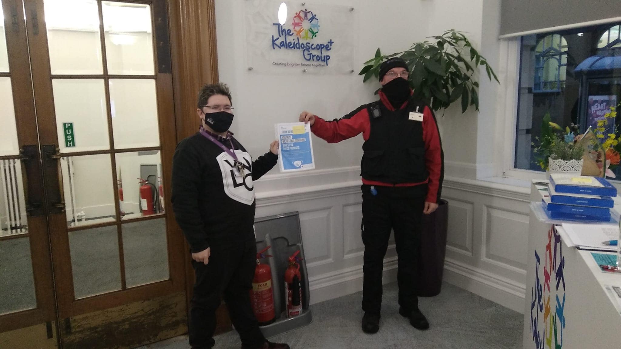 BID Ambassadors deliver Face Coverings Posters to Businesses