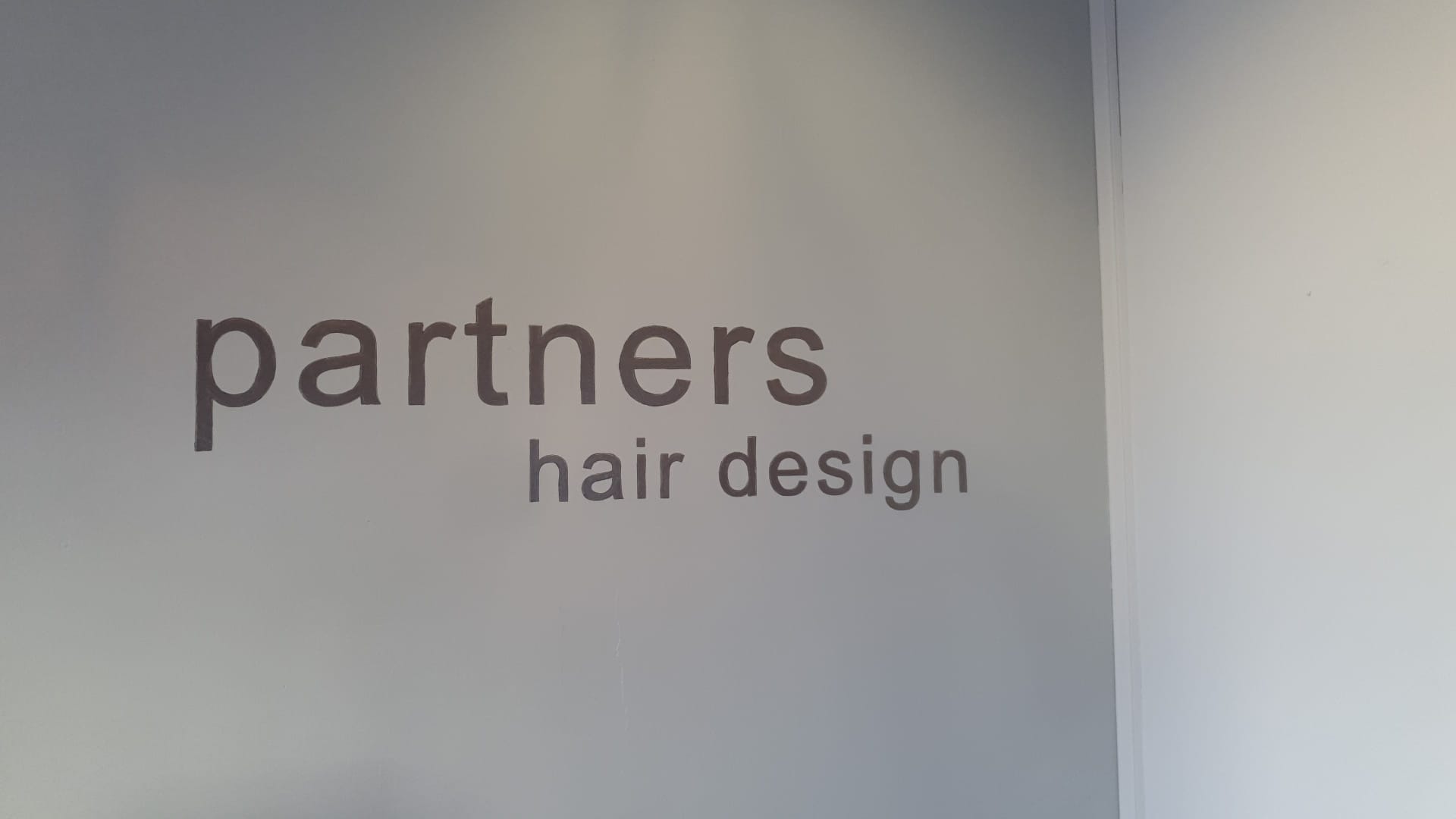 You can book your haircut with Partners Hair Design